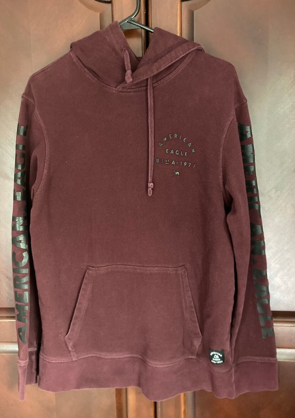 American Eagle -Vintage Look Burgundy Hoodie Black American Eagle On Sleeves - M